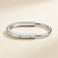 T Lock Bangle In White Gold With Diamonds Bracelet